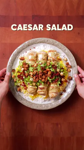Chicken Caesar Kebabs?!! 🥗 Everything is better with rice ep. 4 | Caesar Salad *This is just an experiment! and not a traditional preparation of any of these dishes 👍 INGREDIENTS Caesar salad dressing: - 1 cup parmesan cheese, grated - 1 tbsp anchovies - 1 clove of garlic, finely grated - 1 tbsp Worcestershire sauce - 1 whole egg, cracked - ¾ cup of neutral oil - 1 tbsp hot sauce - 1 tbsp mustard - ¼ cup red wine vinegar - 1 tbsp capers  - salt & pepper Chicken “kebab”: - ½ kg of chicken thighs ground - ½ kg of chicken breast ground - 1 onion, finely grated  - 1 tbsp paprika - 1tbsp garlic - salt & pepper Toppings: - romaine lettuce - homemade croutons - prosciutto (but can be omitted or replaced if you want the dish to be halal)  - basmati rice INSTRUCTIONS:  - Grate a whole yellow onion, and squeeze the moisture out. Add it along with the ground meat, along with paprika, grated garlic, salt and pepper.  - Form these into kebabs and apply it onto skewers and grill until golden brown. Alternatively, you can place the kebabs in an oven at 450F for around 20-30 minutes. - To make the sauce/dressing, in a bowl add all the ingredients listed under “Caesar salad dressing” in the caption. After which hand blend it until thick and creamy. - Serve along with romaine lettuce, croutons, basmati rice, and prosciutto/bacon and enjoy! #asmr #cookingasmr #caesarsalad