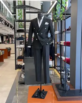 Step up your wardrobe with our black striped suit – a timeless piece that can be styled for any event. From boardrooms to after-hours, it’s your go-to for a sleek, confident look. #MensFashion #SuitStyle #DapperLooks #BlackSuit #ClassicMenswear #GQStyle #SuitUp #TimelessFashion #StripesInStyle#MensFashion #SuitStyle #DapperLooks #BlackSuit #ClassicMenswear #GQStyle #SuitUp #TimelessFashion #StripesInStyle #MenswearEssentials #SharpDressedMan #SuitAndTie #GentlemanStyle #FormalWear #SuitSeason #SuitGoals #TailoredFit #ModernGent #SuitFashion #LuxurySuits #MenWithStyle #SuitAndBooted #PowerSuit #FashionForMen