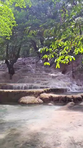 📍Kaparkan Falls , Abra  Hidden Paradise. Kaparkan Falls, also known as Mulawin Falls, is a hidden gem located in the Cordillera Region of the Philippines, in the province of Abra. It is a multi-tiered waterfall with spring terraces that are best experienced during the rainy season Kaparkan Falls was discovered in 2015 and has since become one of Abra's prime tourist destinations. It is known for its unique beauty and its challenging trek To reach Kaparkan Falls, you must first travel to the town of Tineg, Abra. From there, you can take a 