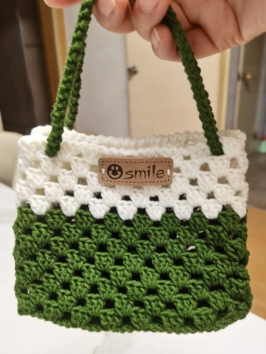 crochet this spring-themed mini bag #Crochet #CrochetLovers #Handmade #DIY #Crafts #YarnCraft  #MadeWithLove