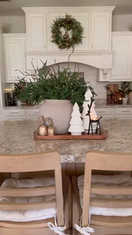 Cozy Christmas centerpiece idea! 🎄 These pine branches are some of my favorite to use for Christmas!! And then the pre lit branches make it even more cozy! I thought the little ceramic Christmas trees were so cute too! And I Added some gold bells bc they feel so Christmasy lol..😂  The reindeer holds a little tea light candle!  When do you put up your tree ? Mines not up yet but I’m ready lol!!🎄🎄 #cozychristmas #christmasiscoming #christmasdecorations #christmasideas #christmasdecorating #christmasdecor #christmashomedecor #christmasdecorideas #holidaydiy #christmascenterpiece 