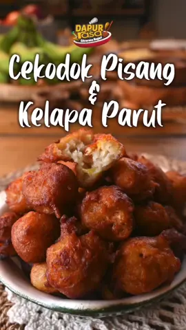 Cekodok Pisang Kelapa Parut: Snek Tradisional yang Menyelerakan Snek klasik ini menggabungkan pisang masak ranum dan kelapa parut untuk menghasilkan rasa autentik yang memikat selera. Nak buatnya pun mudah. CEKODOK PISANG & KELAPA PARUT 5 Biji pisang berangan (anggaran 1 cawan) 2 sudu makan gula Sedikit garam Sedikit soda bikarbonat ½ cawan kelapa parut ¾ cawan tepung gandum Air secukupnya Cara penyediaan boleh tonton di video. Selamat mencuba! #majalahrasa #rasashare #dapurrasa #resipi #resepi #ingatmakaningatrasa #resipirasa #cekodokpisangkelapaparut #kuihtradisi #ResipiTradisional #MakananMalaysia