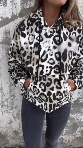 Step out in style with this effortlessly chic leopard print hoodie.
