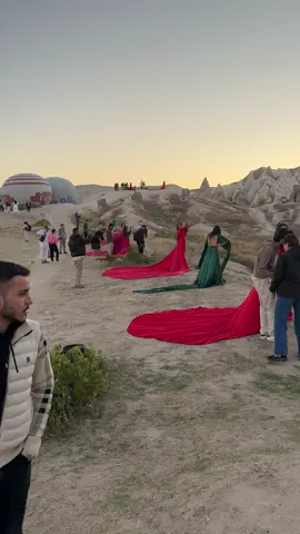 Red dresses everywhere 😂 . . . #cappadociaturkey #camelride #turkey #travel #travel #adventure #bucketlist #thingstodointurkey #turkeytiktok #travelblogger #photoshootturkey #photoshootcappadocia #hotairballoon #hotairballoonturkey #hotairballoonturkeycappadocia 