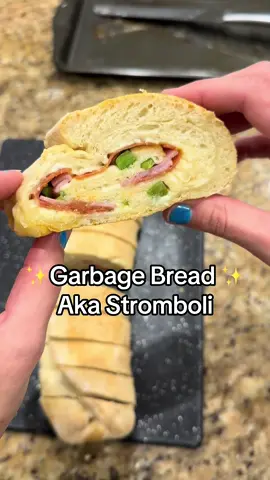 Growing up we called this garbage bread bc you can throw anything you want in it. Apparently it’s actually called a Stromboli 🤣 regardless of what you call it, it’s good and super easy to make! Ingredients  •Pizza Dough (I like the pre rolled kind from Publix to make it easier to shape) •Mozzarella cheese •Desired meats (ham, pepperoni, bacon, etc) •Desired veggies (peppers, pineapples, etc) •Italian Seasoning if desired Prep •Set dough out 1-3 hours before cooking and allow it to rise  Cooking Instructions  •Preheat oven to 350 •Roll out pizza dough into a rectangle (as close as possible) •Sprinkle cheese, and all desired meat and veggies •Begin to roll dough around the filling •Wet edges with milk to help with sticking, then fold and press the extra dough over the edges to seal •Top with a little milk and desired seasoning •Bake at 350 for 30 minutes •Allow to cool, then cut and serve!          #stromboli #lazydinner #easydinner #30minutedinner 