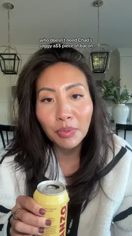 I’d rather bring home my own crispy bacon than settle for Chad’s soggy bacon. Top: @FP Movement  Drink: @Sanzo Sparkling Water  Lighting Pendants: @Lumens  Candle: @LAFCO New York  Vase: @HomeGoods 