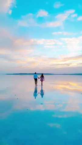 Lake Tuz Pink Salt Lake Near Cappadocia Turkey Lake Tuz is an incredible salt lake in Turkey, near Aksaray but also only just over an hour’s drive away from Cappadocia. The lake is remarkable because of its vibrant pink color. Despite how unique this location is, it’s not very popular, and when I visited I enjoyed the entire lake to myself for as far as I could see. This pink, salt lake is known as Lake Tuz or Tuz Gölü  In this blog post, I will share everything you need to know about Pink Lake Tuz, a salt lake near Cappadocia, Turkey Lake Tuz is actually not directly in Cappadocia, but I did visit it while staying in Cappadocia. This is why I thought it would be valuable to share that with other travelers who are staying in Goreme or the nearby towns of Uchisar or Orthahisar. We drove 1.5 hours from Goreme to reach Lake Tuz, which I have pinned on the map below #cappadocia #cappadociasaltlake #cappadociaphotographers #cappadociaballoon 