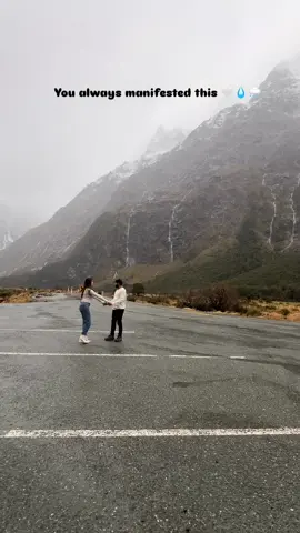 The bollywoodness in me always manifested dancing in the rain with him 🤍 #danceintherain #couple #relatable #milfordsound #nztrip 