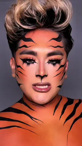 Replying to @Nathan ✝️ AHHH im obsessed with this look sm!!!!🐅🐅 #fyp #makeup #halloweenmakeup #tiger 