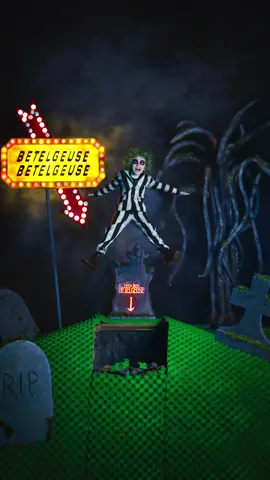 Our family recreated the graveyard scene from the original Beetlejuice! 🪲 this photo was a labor of love to say the least and there were many learning curves along the way, including a windy storm on the day of the photoshoot 😅. It took weeks to plan and create the rolling set. We really wanted to capture a real life moment inspired by the original Beetlejuice movie, which meant all practical effects! From the tree, to the sign, to the foam grass shown in the model town, we made a practical photo set that could move around our entire yard (which will be great for future photos too). Oliver had so much fun playing Beetlejuice, and we are all going to be Beetlejuice characters for Halloween now 😂. We’ll sharing a longer video soon showing how we made each prop. Hope you enjoy this as much as we had fun making it! 🪲🧃#beetlejuice #halloween #spookyseason #photomagic #fyp 