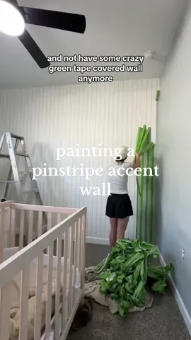 Im painting a pinstripe accent wall & today I pulled the tape to reveal the lines!!  To make sure the lines turned out super crisp I used Frog Tape and sealed in the tape with the base wall color, Delicate White. This helps make sure that if anything leaks through it’s gonna be the same as the wall color first & hopefully prevent the stripe color from leaking through too. I painted 2 coats of Maiden Mist and while the second coat was still wet I pulled the tape to reveal the lines! Tomorrow I’m going to finish up the design by adding staggered prop airplanes all across the entire wall. It’s coming together! What do you think?  #DIY #pinstripeaccentwall #pinstriping #accentwall #airplanenurserytheme #diyaccentwall #paintwithme #vintageinspirednursery #toddlerroomdecor #airplanenurserydecor 