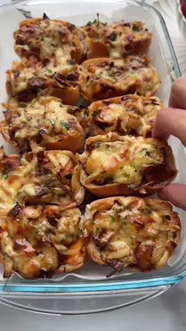 SPICY CHICKEN BUNS WITH CHEESE ONION #spicy #chicken #cheese #onion #buns #food #Recipe #fy #fyp #foryoupage #foryou CHICKEN MIXTURE   25 g unsalted butter   20 ml olive oil   500 g chicken thighs (or chicken breast)   2 g cayenne powder (⅔ teaspoon)   3 g red bell pepper powder (⅔ teaspoon)   3 g onion powder (1 teaspoon)   2 g garlic powder (⅔ teaspoon)   2 g chicken seasoning (⅔ teaspoon)   1 g dried parsley   25 g sweet soy sauce (ketjap manis)   10 g soy sauce   15 g sambal 100 ml heavy cream   50 g grated cheese   ONION MIXTURE 125 g yellow onion (1 yellow onion)   125 g grated cheese   0.5 g dried parsley   SERVE WITH cheddar cheese (or cheese of choice)   BUNS white rolls   Heat the butter and olive oil together in a skillet over medium heat. Add the chicken, cayenne powder, red bell pepper powder, onion powder, garlic powder, chicken seasoning, and dried parsley. Cook the chicken for 4-5 minutes. Add the sweet soy sauce, sambal, soy sauce, and heavy cream. Increase the heat to high and let the sauce thicken slightly (keep an eye on it).   Remove the pan from the heat and stir in the grated cheese. Set aside.   Peel and chop the yellow onion. In the same skillet over medium heat, cook the onion for 5-7 minutes until caramelized.   In a bowl, combine the caramelized onion, grated cheese, and dried parsley. Mix well.   Cut the white rolls in half and carefully remove the inside or press it in to create a hollow.   Fill the hollows with a layer of cheese of choice and the chicken mixture. Place the filled rolls on a baking dish.   Top the rolls with the onion mixture. Place the baking dish in a preheated oven at 200 °C (390 °F) and bake for 5-7 minutes, or until the cheese is melted.