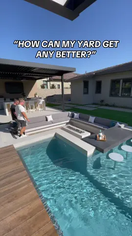 Can a luxury backyard like this get any better? Watch to find out! 👀 #pool #pooldesign #pooldesignideas #landscapedesign #sunkenfirepit #sunkenseating #firepit 