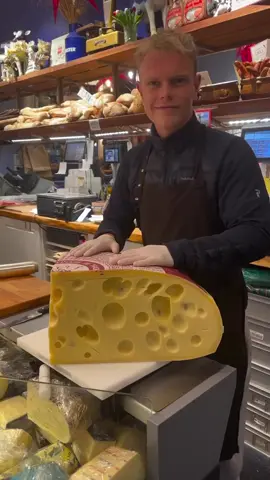 Emmental Lait Cru at @helgesost  Emmental Lait Cru is a traditional Swiss🇨🇭cheese made from raw, unpasteurized milk, giving it a richer and more complex flavor profile. Known for its characteristic large holes, the cheese has a mild, nutty taste with a creamy texture. It originates from Switzerland’s Emme Valley, though versions are also produced in France. Only Swiss-made Emmental can carry the Emmentaler AOP label, certifying its Swiss origin and production standards.