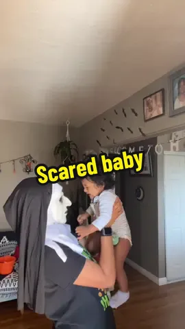 Woke up ready for halloween ! Except josiah he does not dig the mask 😂🖤 #halloween #num #scaredbaby #skooky #scary 
