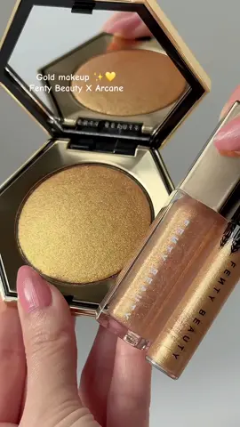 Going for gold 💛  @fentybeauty x @arcaneshow make-up collection Swatching: ✨ Mel inspired #GlossBomb in 'Risky Rulin' - Shimmering warm gold ✨ Mel inspired #DiamondBomb in 'Golden Rul'r' ⭐️ Mel inspired #GlittyLid Eyeliner in 'Mel'odic Moves' Glam and animation collide in the world of #FentyxArcane ⚡️Launching on 2nd November ⚡️ #Arcane #fentybeauty #fentyface#glossylips #lipgloss #lipglosspoppin #giftguide  #goldhighlighters #goldliquidliner #thatgirlaesthetic #asmrunboxing #prettymakeup Luxe makeup . Beauty community. Makeup favourites. viral makeup,  makeup looks , minimal makeup, beauty product recommendations . aesthetic beauty, Vanity makeup  . Makeup tutorial. Makeup collection . Glam makeup . Beauty community . Holy grails . Product photography. Top shelf beauty . Nail arts nails design .Makeup worth the money . Makeup ideas .    #luminousskin #glassskin #beautyproducts #softgirl   #glowymakeup#makeupcommunity #ａｅｓｔｈｅｔｉｃ  #explorepage #trendingbeauty  #beautysharing #makeupcloseup #makeuptherapy #makeupgirl