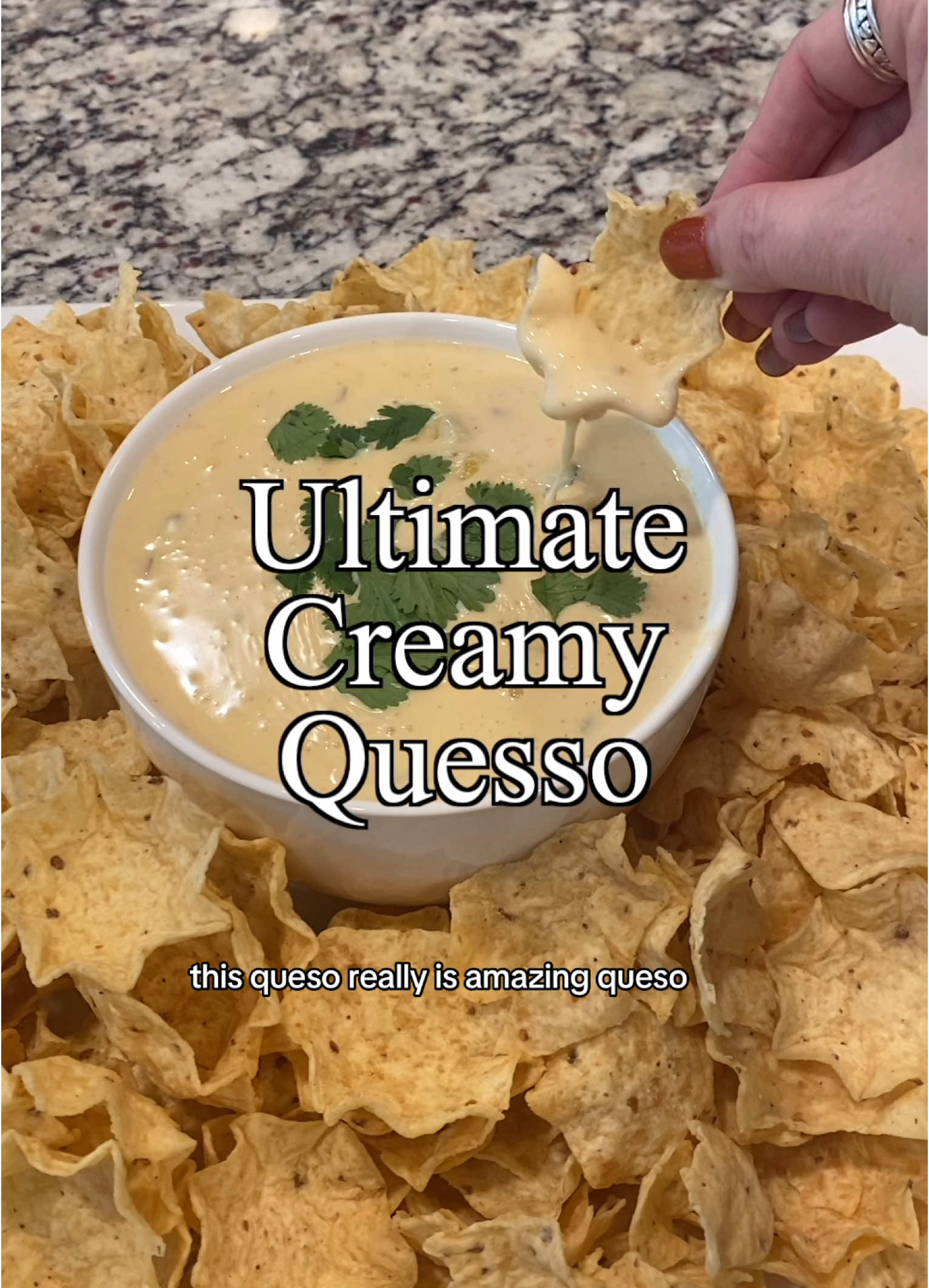 Creamy, Flavor-Packed Queso Dip This queso is ultra-creamy, loaded with just the right amount of spice, and features the rich, roasted flavor of green chilies. For the best results, be sure to use high-quality cheese—get it from the deli rather than prepackaged, as it melts smoother and adds a richer taste. The blend of white American and pepper jack cheeses brings a smooth, melty texture with a hint of heat. Pro tip: Make it ahead of time and reheat when you’re ready to serve—the flavors only get better as they meld together! Ingredients: •	1 pint half and half (avoid fat-free for best results) •	1 pound high-quality white American cheese, cubed (deli-fresh, not prepackaged) •	8 ounces pepper jack cheese, shredded or sliced (deli-fresh, not prepackaged) •	1/4 teaspoon kosher salt •	1/4 teaspoon onion powder •	1/2 teaspoon chili powder •	1/2 teaspoon garlic powder •	1/2 cup (1 4.5-ounce can) roasted green chilies Optional Toppings: •	Chopped fresh cilantro •	Diced tomatoes •	Sliced jalapeños •	A dash of hot sauce for extra heat Instructions: 1.	In a medium saucepan, combine the half and half, salt, onion powder, chili powder, and garlic powder. Cook over medium heat, stirring frequently (especially near the end), until bubbles form around the edges and it’s almost boiling. 2.	Reduce the heat to medium-low, then add the white American cheese and pepper jack cheese gradually, stirring constantly. Continue to stir until all the cheese is melted and the mixture is smooth. 3.	Stir in the roasted green chilies and cook for an additional 2-3 minutes until everything is combined and heated through. 4.	Serve warm with tortilla chips or use as a topping for nachos, tacos, or any dish needing a creamy, cheesy boost. If you make this queso ahead, simply reheat before serving—it’ll taste even better as the flavors meld together! #QuesoDip #CheesyGoodness #HighQualityCheese #DeliFresh #GameDaySnacks #SpicyDip #MakeAheadRecipe #CreamyQueso #TacoTuesday #PartyFood #DipRecipes #FoodieFavorites #AppetizerGoals #MeltedCheese #GreenChilies #ComfortFood #MexicanInspired #CheeseLovers #FlavorPacked #YummyEats #SnackTime #DeliciouslyBold