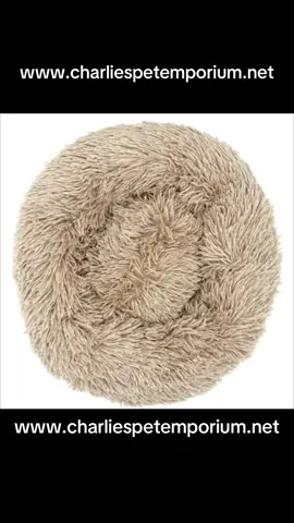Pet Donut Bed. Provide your furry friend with the ultimate comfort in this user-friendly design Pet Dog Bed with raised rim for head and neck support. Lightweight, portable, and easy to care for. Available in multiple natural colors and sizes. Your pet's perfect travel companion. #charliespetemporium #smallbusinessowner #smallbusinesstiktok #pet #cat #catsoftiktok #dog #dogsoftiktok 
