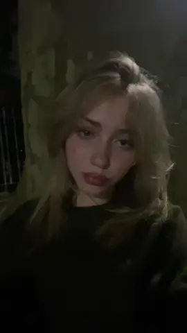 mysterious loner shy opium girl being sexy sitting against a tree