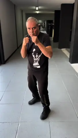 When you throw a jab to the body, drop your level so your shoulder covers your chin for protection. #papaiosif #boxing #family #boxingtraining #boxingforall #fyp #foryou 