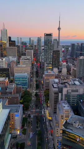 A Glimpse of the Toronto Skyline in Twilight Glow #toronto  #skyline  #explore  #canada🇨🇦  #fyp 