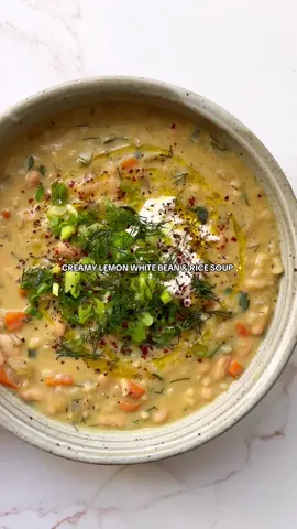 Creamy Lemon White Bean & Rice Soup!!! (vegetarian, recipe below!!) I do not like sup unless it is THICK and CHUNKY — it is the only way. This recipe is a spin on Greek Avgolemono soup, but the vegetarian version made with white beans!  RECIPE (serves 4) 2 tbsp olive oil ½ large (or 1 small) yellow onion, chopped 1 celery stalk, chopped 1 medium carrot, chopped 6 cloves garlic, finely chopped 8 cups vegetable broth 1 cup rice Juice of 3 lemons 3 eggs 2 (15.5 oz) cans white beans, rinsed and drained ⅓ cup roughly chopped parsley 2 tbsp chopped dill To top: sour cream & green onions Add the olive oil to a large pot or Dutch oven on medium heat. Add the onion, celery, and carrots, and season with salt and pepper. Cook for 7-8 minutes until veggies have softened, stirring occasionally.  Add the garlic, and cook for a minute or two until fragrant. Add the vegetable broth, and bring to a boil. Add the rice, lower the heat to medium-low, cover, and cook for 20 minutes, stirring occasionally.   While rice is cooking, whisk together eggs and lemon juice in a medium bowl. Add a big splash of broth from the soup, and whisk together thoroughly. When the rice is done cooking, add in the white beans, your lemon egg mixture, parsley, and dill. Mix together and make sure the egg is incorporated, and then let simmer for a few more minutes. Serve warm, topped with sour cream and green onions, if desired. 
