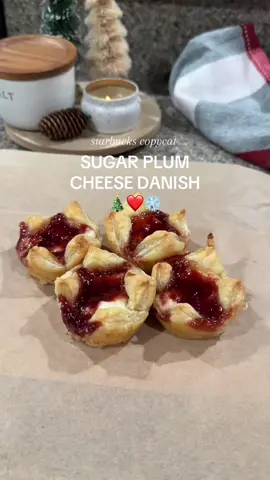 Sugar plum cheese danish (Starbucks copycat) 🎄 Recipe below is for 1 puff pastry sheet but you’re gonna probably want to double it for the two sheets because they are addicting!  Ingredients: 1 thawed puff pastry sheet 1 8 oz package of cream cheese softened 1/2 cup sugar (I used powder but you can also use granulated) 1 teaspoon vanilla extract  1/2 cup plum jam  1/4 teaspoon ground cinnamon 1/8 teaspoon ground nutmeg  1. Preheat oven to 400 degrees  2. Mix softened cream cheese, sugar and vanilla extract. 3. In a separate bowl, mix plum jam, cinnamon and nutmeg. 3. Cut 1 puff pastry sheet into 9 squares. 4. Place cut sheets into a greased cupcake tin.  5. Add cream cheese mixture and then the jam mixture. Don’t over fill.  6. Bake for 14-18 minutes. Keep an eye on them after the 14 minutes or they may end up a mess. Mine took exactly 14 minutes but all ovens are different.  7. Cool slightly before serving. Store in the fridge. Retoast leftovers (if any).  #sugarplum #sugarplumcheesedanish #cheesedanish #christmasrecipes #christmas #christmasdessert #starbucks #starbuckscopycat #holidayrecipes #holidaydesserts #puffpastry #easydessert