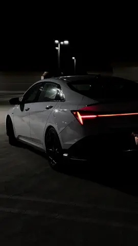 Mmmm The 2024 Hyundai Elantra N Line is a sportier, performance-focused version of the standard Elantra sedan, designed to bridge the gap between the regular Elantra and the high-performance Elantra N. Here’s what makes the 2024 model special: Performance The Elantra N Line is powered by a turbocharged 1.6-liter inline-four engine, producing around 201 horsepower and 195 lb-ft of torque. This engine is paired with either a 6-speed manual transmission or a 7-speed dual-clutch automatic transmission (DCT). The DCT provides quick and smooth shifts, making it an appealing choice for those who want a sportier drive. The N Line’s suspension and chassis are tuned for more responsive handling and a stiffer, sportier feel, with better cornering ability compared to the base Elantra. Design The 2024 Elantra N Line has a more aggressive design than the regular Elantra. It features a blacked-out front grille, larger air intakes, N Line badging, side skirts, and unique 18-inch alloy wheels. A dual exhaust system with a sport-tuned sound adds a bit of auditory excitement as well. The sleek, angular body design and lower stance give it a more dynamic and athletic appearance. Interior Inside, the N Line gets sport seats with unique stitching, a leather-wrapped steering wheel, and other N Line-specific accents, like aluminum pedals and red contrast stitching. The interior also includes a digital driver display and an 8-inch or optional 10.25-inch infotainment screen with Apple CarPlay and Android Auto. It’s designed to be sporty yet comfortable, with a focus on driver engagement. Technology and Safety Hyundai equips the N Line with a suite of advanced safety features, including forward collision warning, lane keeping assist, blind-spot monitoring, and adaptive cruise control. There’s also an optional package with additional tech upgrades, like a larger digital gauge cluster. Price and Competitors Priced competitively, the 2024 Elantra N Line sits in the affordable performance compact sedan category. It rivals models like the Honda Civic Si, Volkswagen Jetta GLI, and Mazda3 Turbo. The N Line is a good option for drivers seeking an energetic drive without going to the high-performance, track-oriented Elantra N. Overall, the 2024 Hyundai Elantra N Line offers a balanced mix of performance, style, and practicality, appealing to drivers who want a sporty experience without breaking the bank. #fyp #forupage #foryourpagetiktok #stance #elantran #elantranline 