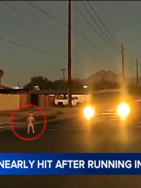 Heart-stopping video shows a toddler wandering into a busy street in Arizona, and nearly getting hit by passing cars before being rescued by a good Samaritan. The terrifying moment unfolded Friday in an intersection in Mesa that Adriana Bello says is always very busy. That's when she saw a 2-year-old boy wearing nothing but a diaper run across the street.