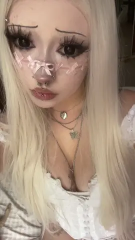 This took so long to do#makeuplook #doll #dollmakeup #ribbonmakeup #pinterest #headlock #fypシ゚viral 