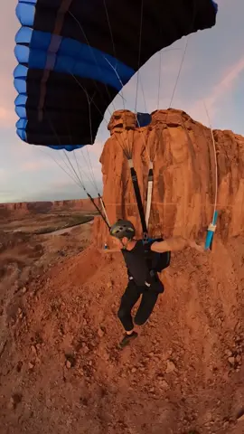 The most epic sunset jump! 🌅🪂 Soaring through the golden glow of Moab’s iconic cliffs during sunset is a surreal experience. The rocks light up in deep orange hues, creating the perfect backdrop for a heart-pounding BASE jump. This is the kind of adventure that makes you feel truly alive. Would you take the leap? 🤔