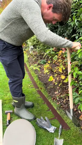 Installing Everedge 🌱 Give your lawn edge definition with this weather resistant, maintenance free, 1.6mm thick galvanised steel lawn edging, coated in a corrosion resistant brown paint, which research has revealed to be the most natural colour for the majority of applications. Manufactured from almost 100% recycled material using British Steel. Extremely flexible suitable for small and large projects. The 1m lengths are easily installed with a hammer, screwdriver and block of wood, straight lines and corners can be given a neat finish, and the tedious task of continuous edging is eliminated. The spikes hold the lengths securely in the soil and the lawn can still be cut; please allow 6% extra for overlap when calculating the amount required. Supplied in a Pack of 5 x 1 metre lengths each 7.5cm deep (above ground) with a total depth of 17cm (including spikes). The steel lawn edging can be cut to size with either a hacksaw or a grinder with slotting disk, if necessary. The lawn edging can be shaped around curves as it is flexible e.g. a 1m length can almost make a circle.  To buy Everedge please use my promo code 24TOM10 for 10% off at www.harrodhorticultural.com @Harrod Horticultural  I’ve got a 10% discount promo code GWTLAWN2024 for you at www.bostonseeds.com on lawn seed, fertiliser, mini handheld spreader and lawn drop spreaders 👍 I’ve got a 10% discount promo code GWT10 for you at www.fieldcompost.co.uk @Field Compost Ltd on Field No.6 Premium Grade Topsoil  Jumper from @folkclothing  Boots from @Fenchamuk  Trousers from @Crew Clothing  #everedge #everedge_uk #garden #gardening #gardening101 #gardeninghacks #gardeningtips #gardeningtools #gardeningtiktok #gardeninghack #gardeningideas #gardeningtipsforbeginners #gardeningforbeginners #gardenersworld #gardeners #gardenersoftiktok #gardenerslife #gardenersofinstagram #gardenersfriend #gardenersofthegalexy #gardenwithtom #lawn #lawncare #lawntok #lawntiktok #lawns #lawnsoftiktok #lawnservice #lawnseason #lawncarenut #lawncarelife #lawncaretiktok #lawncareservice #lawncaretips #lawncarereels