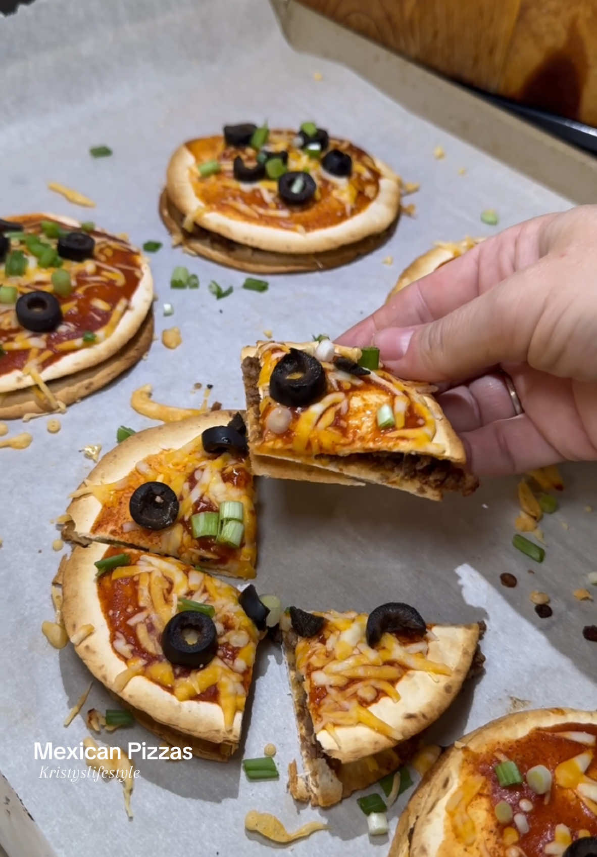 Mexican Pizzas This is an easy meal that your whole family will love!! You can add on some refried beans if you’d like as well. I meant to do that as I usually do, but forgot.  *My homemade taco seasoning can be found in all of my cookbooks and meal plans as well as on my FB, IG and Pinterest pages.  www.Kristysketolifestyle.com RECIPE - Makes 6 12 zero carb street taco tortillas 1/2 lb ground beef  1 Tbsp homemade taco seasoning  1/2 Tbsp tomato paste  2 Tbsp water 6 Tbsp Taco Bell Mild Sauce 1 & 1/2 cups shredded Colby Jack cheese  black olives  sliced green onions  avocado oil spray DIRECTIONS: 1. Preheat oven to 375 degrees F.  2. Scramble the ground beef until cooked through. Drain excess grease  3. Add in the taco seasoning, tomato paste and water. Stir until combined and then set aside.  4. Place 12 tortillas spread out on a parchment lined baking sheet and spritz them with avocado oil spray.  5. Bake for 5 minutes and then remove from the oven.  6. Sprinkle 1/3 of the cheese on 6 of the tortillas.  7. Equally divide the taco meat amongst those 6 tortillas.  8. Sprinkle on a little more cheese but be sure to save some for the top.  9. Place the 6 tortillas that have nothing on them on top of each of those 6 tortillas with the meat and cheese.  10. Spread 1 Tbsp of taco sauce on each one followed by the remaining cheese.  11. Bake for 5-10 minutes or until cheese is melted.  12. Garnish with black olives and green onions. *Chopped tomatoes are good on these as well!! I also forgot those. 🤦🏼‍♀️🤣 NUTRITION: 1 Mexican pizza | 0g net carbs | 5g total carbs | 5g fiber | 180 calories | 18g protein | 11g fat | 0.1g sugar  WW- 5 points #recipes #mexicanfood #pizza #mexicanpizza #lowcarb #keto #weightwatchers #food #reels #kristysketolifestyle #kristyslifestyle