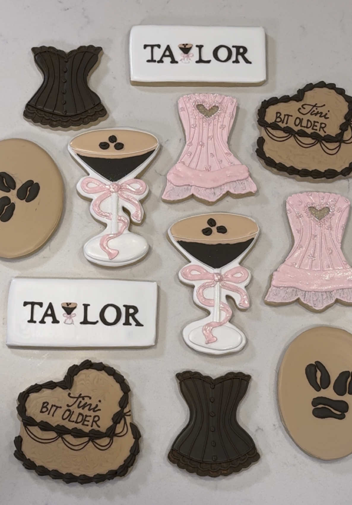 Espresso Martini Cookie set for the birthday theme “a tini bit older”💗☕️✨🎀🍸 also somehow I forgot to include the bows in the final shot but she did get those cookies too!!☺️ #cookiedecorating #cookiedecorator #espressomartini #espresso #sabrinacarpenter 