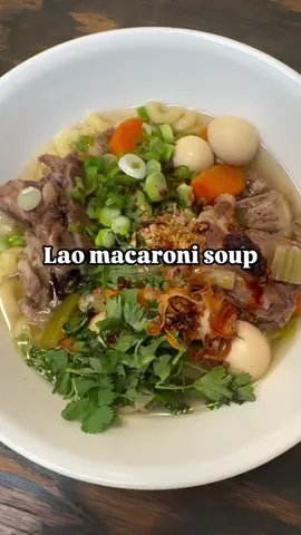 👩🏻‍🍳 my famous ✨Lao macaroni soup✨ Ingredients:  2 lbs Pork neck bones 2 lbs Pork spare ribs  1-2 cans Quail eggs  1-2 Carrots, sliced 1/4 inch  1 head of Celery, sliced 1/4 inch  1 bag Pasta of choice  Fish sauce  Chicken bouillon powder White or black pepper  Aromatics:  3-4 slices of Ginger, sliced and charred  1 Onion, whole peeled and charred  2-4 stalks of Lemongrass 5 Kaffir leaves  Directions:  Parboil pork, rinse and add to instant pot add carrots, celery and aromatics  Fill water to right below max line  Add seasoning:  1 tbsp Fish sauce 3 tbsp chicken bouillon powder  Set to manual high pressure for 45 minutes  Cook pasta according to directions, drain and set aside. Note: I like to leave the pasta and soup separate bc the pasta tends to soak up the broth. If you’re serving immediately, you can add their pasta, otherwise keeping separate is best.  Drain and flash cook quail eggs for about 1 minute to get rid of any canned/metal taste, drain and set aside.  Once instant pot is done, carefully adjust lid to “venting”, use a kitchen towel to catch any liquid. If you have time, you can let it natural release.  Remove aromatics - ginger and kaffir leaves. Optional, you can leave in or remove the onion.  Add quail eggs.  Additional seasoning:  2 tbsp fish sauce 2 tbsp chicken bouillon 1 tsp msg  1 tsp white pepper or black pepper  Adjust taste as needed. Note: I like to make the broth seasoned just enough, that way people can add to their preference.  Toppings:  Green onions Cilantro  Fried onions/shallots  Fried garlic Chili oil Lime #soupseason #laofood #macaronisoup #laorecipe #asianrecipes #soupszn #EasyRecipe #instantpot #souprecipe 