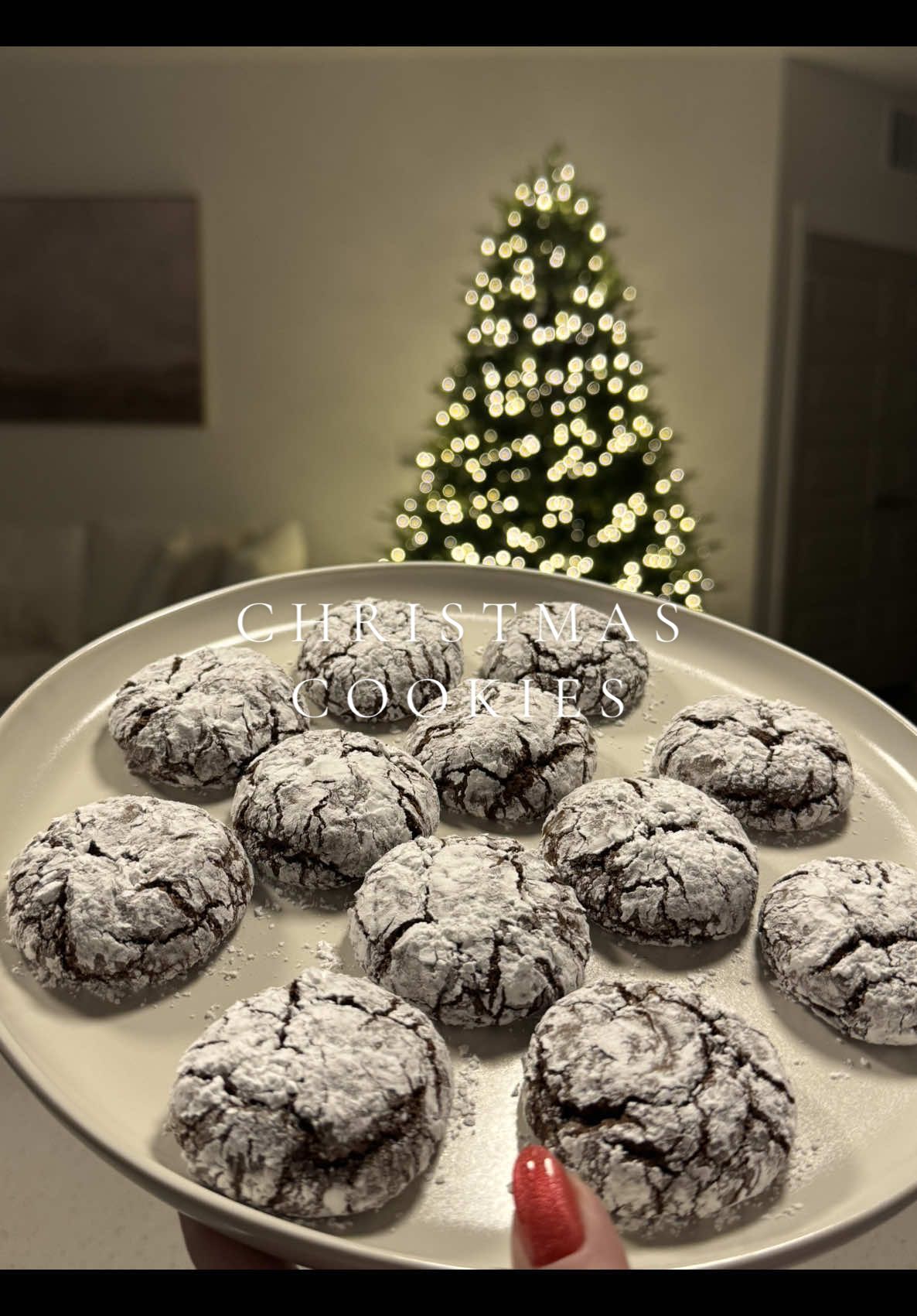 first time ive tried this recipe and they are DELICIOUS🫶🏻✨ FULL RECIPE BELOW:  - 1 cup flour - 1/2 cup cocoa powder - 1 teaspoon baking powder - 1/4 teaspoon salt - 1/2 cup sugar - 1/4 cup brown sugar - 1/4 cup vegetable oil - 2 eggs - 1 teaspoon vanilla extract - 1/2 cup powdered sugar Place in fridge for 3 hours. Bake at 350 degrees for 11-12 minutes. #bake #christmas #christmascookies #holiday #holidays #holidaybaking #cookies #crinklecookies #foryou #christmasbaking #baking #aesthetic 