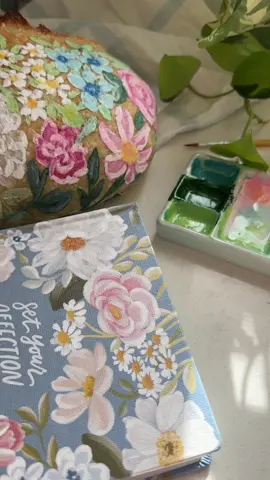 Part 1/4 of my “Painting Sourdough to Match My Bible” Series 🎨🖌️📚🍞💐 This loaf is inspired from the Flora Theme Bible, which is available to order on Amazon now! 🌷@christianartgifts  #sourdough #paintedsourdough #handpainted #baking #foodart #baking #sourdoughbread