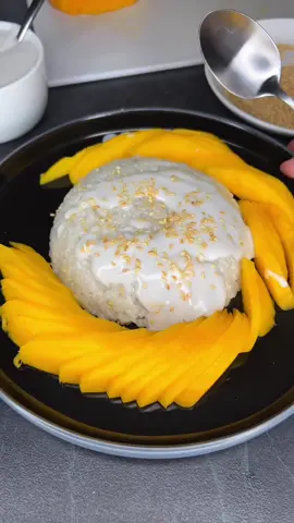 Episode 4:Mango sticky Rice Love at first bite, was so so good I cannot stress that enough. Ingredients  -Thai glutinous rice  -1 can coconut milk/cream -1/4 cup sugar -1/4tsp salt -1tsp cornstarch mixed with water  -Mangoes Method; -wash the rice until water runs clear then soak for a minimum 6hours -Steam the rice until cooked. -in a pan mix coconut milk, sugar and salt until sugar dissolves. -pour over the cooked rice and reserve some of it. -Mix into the rice until well combined  -Yo the remaining coconut mixture add in cornstarch slurry and mix to thicken. -toast sesame seeds for an extra boost of flavour. #mangostickyrice #thairecipes #thaidessert #mangorecipes #goodfood