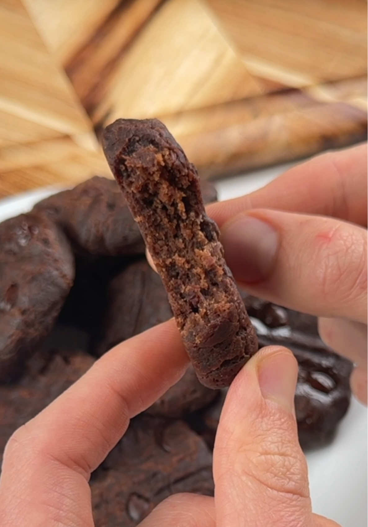 Say “YUM” if you would eat these Fudgy Banana Cookies 🍪🍌🍫 What you need: 2 bananas, very ripe 1/3 cup cocoa powder 1/2 cup peanut butter Optional: 1/4 cup chocolate chips How to make them: 1. Preheat your oven to 350F. 2. Mash your banana fully and stir in remaining ingredients.  3. Use a cookie scoop to make cookie shaped piles on a parchment lined baking sheet. 4. Bake for 15 minutes, take them out & let cool.  Pro tip: The dough is supposed to be super wet, so if you have to scoop it instead of make balls that’s ok 👍