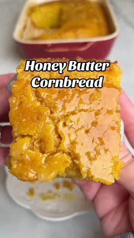 Tender and delicately moist Honey Butter Cornbread is like nothing you’ve had before. With a buttery sticky sweet glaze, it’s almost sweet enough to be a dessert. It’s super soft and full of corn flavor making it the perfect pairing for chili and soups and of course as a side dish to go along with your holiday spread! #cornbread #honeybutter #honeybuttercornbread #sidedish #thanksgivingrecipes #sidedishes #holidayrecipes 