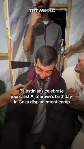 Palestinians celebrate their friend, journalist Saleh Aljafarawi’s birthday in a displacement camp in southern Gaza, as Israeli corridors separate him from his family in the north. Israel has displaced over 1.9 million Palestinians since October 7 last year, according to a UN report.