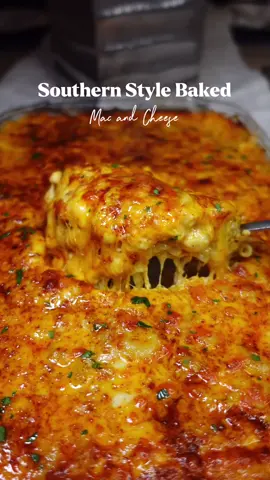 Southern Style Baked  Mac ‘n Cheese  (via @Danielle)  Recipe:⬇️ (an estimate/makes about 2 trays) CHEESE MIXTURE: -(2) 32 oz sharp cheddar cheese (save about 2-4 cups for topping) -16-24 oz mozzarella cheese  -12 oz smoked flavor provolone cheese  MILK MIXTURE: -2-4 Eggs -4 1/2 cups heavy whipping cream -4 cups whole milk -2 tsp black pepper -1 tsp paprika  -1 tsp salt -1 tsp onion powder  -1 tsp garlic powder MACARONI: -2 lbs of macaroni elbows -32 oz less sodium chicken broth -water -1 stick salted butter -1 1/4- 1 1/2 cup sour cream -milk mixture (save some for layering) -cheese mixture (save some for layering) -2 tsp black pepper -2 tsp paprika  -2 1/2 tsp onion powder  -1 tsp garlic powder -Salt to taste (I did not measure so adjust seasonings to taste) STEPS: (estimate) 1.Pre-heat your oven to 375-400F  2.Boil macaroni noodles in chicken broth, water, and salt (optional) until al dente. Drain (DO NOT rinse) and return to pot immediately 3.In a bowl, mix eggs, heaving whipping cream, whole milk, and seasonings  4.Add 1 stick of butter to macaroni noodles and mix until melted. Add sour cream and mix  5.Add about 1/3-2/3 of the cheese mix, 1/3-2/3 of the milk mixture, and seasonings. (Adjust to your liking) Mix until cheese is slightly melted. 6.Spray tray with non-stick spray. Add macaroni, the milk mixture, and then the cheese mixture. Repeat.  7.Last layer top with sharp cheddar, then sprinkle paprika  8.Cover tray with foil paper (don’t let it touch the top layer) and bake for about 30-40 minutes.  9.Remove the foil and set oven to Broil to add a bit of crisp to top layer. (Keep a close eye because it can burn) 10.Let it sit and then enjoy! #blackfoodiefinder #macncheese #macandcheese #macandcheeserecipe #thanksgiving #thanksgivingrecipes #holidayrecipes #homecooking