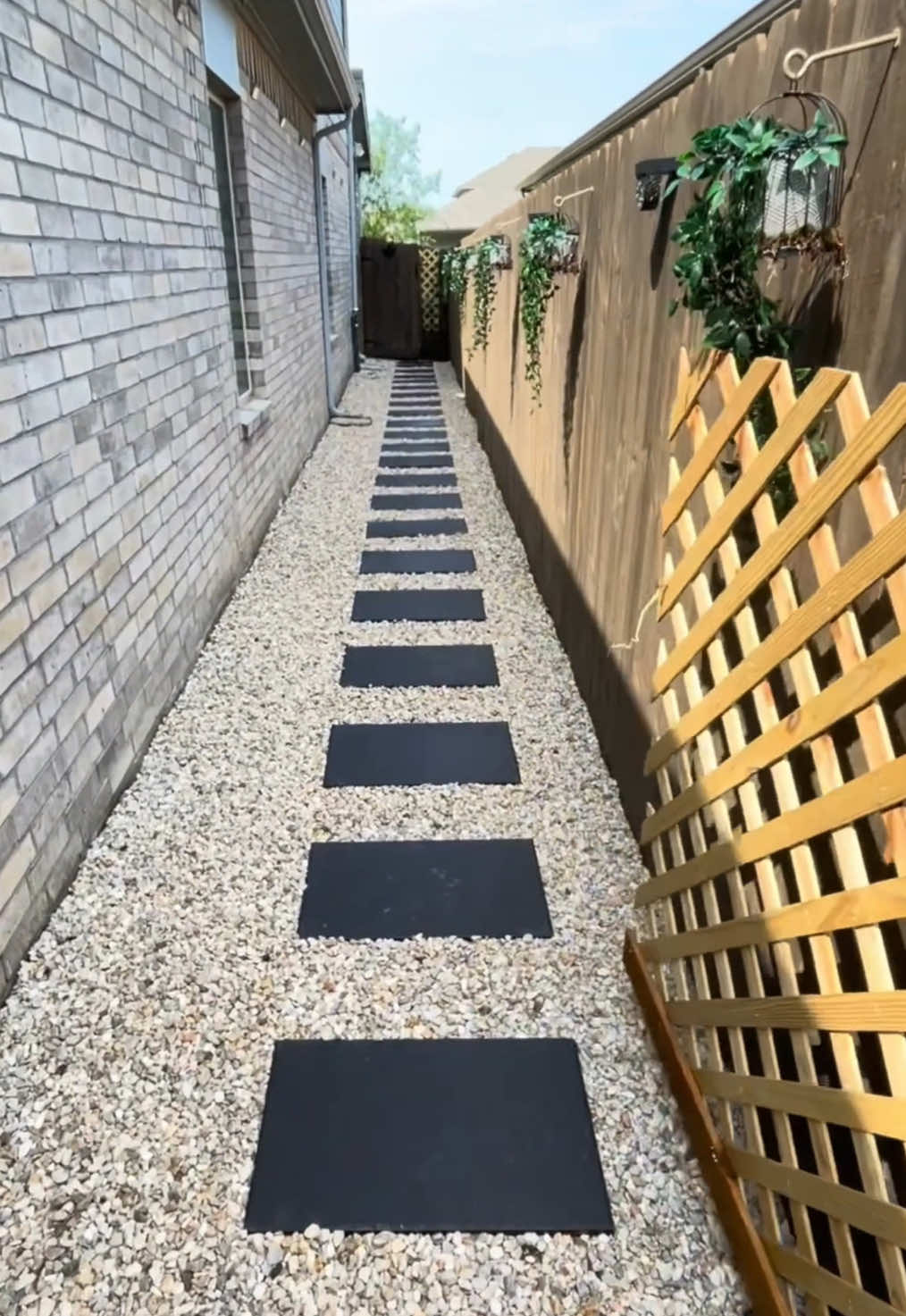 take a look at this backyard transformation! We designed and installed beautiful gravel pathways and added 1x1 limestone squares around the hot tub for a clean, modern look. The combination of pathways and limestone gravel not only enhances the space but also makes it beautiful. Let us help you upgrade your backyard! #fyp #asmrvideo #satisfying #landscape #gravelpathway