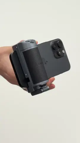 Who needs a bulky DSLR when your phone can do it all? Meet the TELESIN Smartphone Camera Grip – the perfect blend of style, function, and just a pinch of “look at me, I’m a pro!” vibes. This little gadget transforms your phone into an SLR wannabe in seconds. ✅ Click, Zoom, Switch: Snap pics, zoom in on your cat (or breakfast), and swap between lenses with a satisfying click—no app required! ✅ Smooth Operator: With its ergonomic leather grip, it feels like luxury in your hand and keeps your shots steady even if your coffee didn’t. ✅ Shape-Shifter: Handle? Bracket? Selfie stick? This grip is whatever you need it to be, just like your favorite multitasking friend. ✅ Pocket-Sized Pro: Lightweight, compact, and ready for travel—because great pics don’t take themselves. Whether you’re a selfie enthusiast, TikTok creator, or just someone who loves a good gadget, this grip’s got you covered. @TELESIN_Official  #TELESIN #SmartphoneCameraGrip #MobilePhotography #TechGadgets #TechAccessories #UnboxingExperience #ContentCreationTools #CreatorGear #PhotographyGear #MobileVlogging #CameraEssentials #CompactDesign #PhotographyTools #OnTheGoSetup #TravelPhotography #VloggerTools #SelfieStickUpgrade #InnovativeDesign #GadgetLover #TechReviewers #PhotographyLovers #MinimalistTech #CompactGadgets #TravelFriendlyGear #TechUnboxing