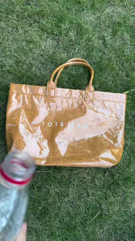 This is the best tote bag for school that’s waterproof ☔️  With compartments that can fit your 16” laptop, drink bottle and school books - including binders/folders! #totebagforcollege  #totebagforschool  #totebag  #whatsinmybag  #unibag  #collegebag  #schoolbag  #workbag #totebagwithcompartment  #totebagwithzipper 