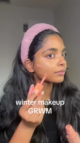 a calm little grwm 🫶🏾🤍  . @Caudalie vinoperfect toner & serum @Huda Beauty peach color corrector, easy blur foundation in TOFFEE, concealer in TOASTED ALMOND @Too Faced BTS eyeliner @hudabeautyshop baking powder & lip tint & face glow @COVERGIRL mascara  #grwmmakeup #MakeupRoutine #wintermakeup #girlgrwm 