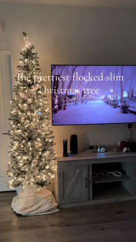 The prettiest flocked slim christmas tree!! I absolutely LOVE it! Also its baby approved:) 🎅🏼🌲✨ #fyp #foryou #christmas #christmastree #boymom #babyboy #slimtree #pretty #mama #family 