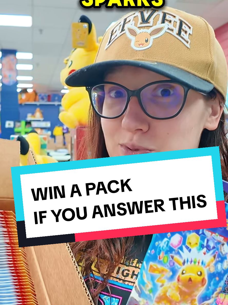 HE PULLED IT FROM A FREE PACK! 👀 Pokémon Trivia   #pokemoncards #pokemontrivia #pokemondragon #charizard #surgingsparks 