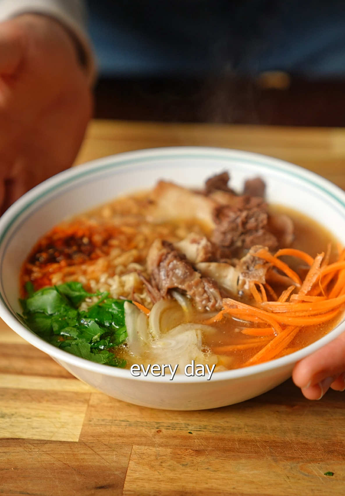 Garlic Miso ramen low calorie meal that’s The holidays are in mid swing and thanks giving just finished up. I like to eat lighter during the week after thanksgiving and this miso ramen is perfect since it’s low calorie and delicious.  Recipe  Bone broth In a pot add 7 to 10 cups of water and bring to a low boil. Add a whole leak, a whole onion, three 1/4 in slices of ginger, for the meat add any bone in cut you prefer I used a whole ox tail cut up, add 2 tbsp fish sauce and 4 tbsp of soy sauce. Boil in he broth for 4 to 6 hours or longer the longer the better, add water or stock if it gets below 60 to 70%  Once done strain broth to get any small bones out and return heat now add 1 to 2 tbsp of miso and 2 tbsp of garlic powder and salt to taste. Cook ramen in broth  2 to 3 oz ox tail 70 calories ramen 370 calories Toppings I add fresh onion slices, parsley, fresh carrot, chilli crunch, and ox tail, the egg is optional but if you do it adds about 100 calories 30 to 100 calories Optional egg Poke a pin hole through you uncooked egg, in a pot add water and some baking soda, boil the eggs for 6 minutes to be soft or 8 to be hard. Immediately place in an ice bath to stop cooking and peel once cooled.  In a container add 100g or teriyaki sauce, 50g of soy sauce, and 1/4 cup of water, place all eggs in container and let sit in there till your ready to use them. Total 444 calories 12g protein per ramen pack and bowl #ramen #ramenlover #lowcalorie #ramenlover #FoodLover