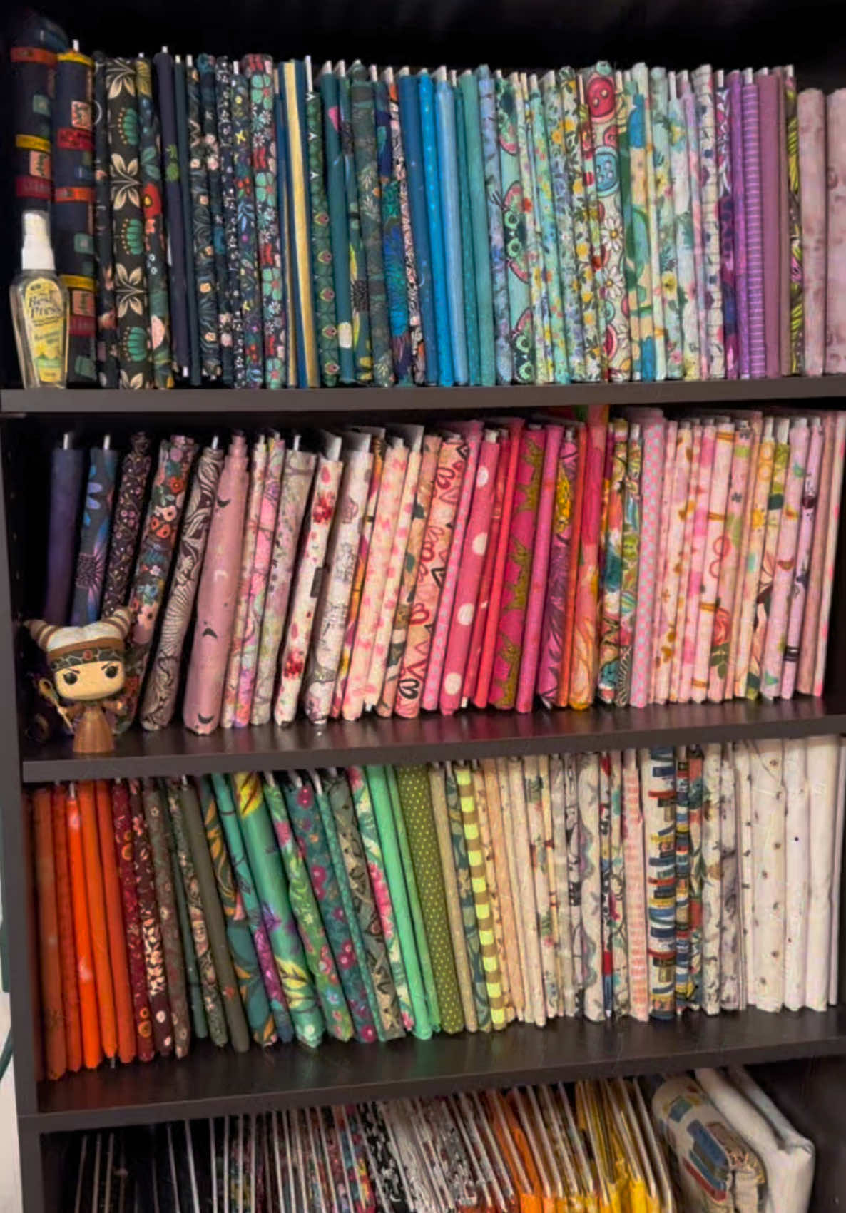 I finally got around to folding all the fabric I have laying around onto foam comic book boards and stored away on my bookshelf. 😍 I’ve been tripping over them for months and I honestly don’t know what took me so long to put them away.  I love storing my fabric this way because it’s pretty to look at but it’s also so much easier to just grab what I need and not worry about knocking over an entire pile of fabric. 🙊  Plus, I get to really look at my fabric stash as I fold it up and just drool 🤤 over how pretty they are. Fabric designers just are next level talented.  How do you store your fabric?  . . . #FabricStorage #PrettyThings #SmallBusiness #ShopSmall #HouseOrganization #Sewing #Handmade #CraftOrganization #SewingCommunity #SewingLove #SewingAddict #SewingRoom #SewingStudio #SewingInspiration #SewingProjects #SewingLife #prettyfabric #smallspaceliving #SewingNotions #SewingSupplies #SewingTools #SewingAccessories #Fabrics #SewingThreads #homestorage #organization #fabricdesign #fabricdesigner #SewingTips #fabricstash 